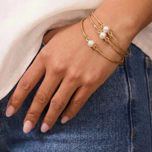 FLYING LIZARD DESIGN PEARL AND GOLD BANGLE