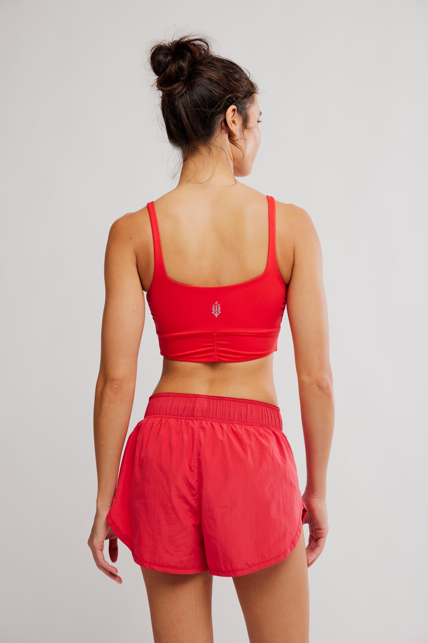 FREE PEOPLE NEVER BETTER REVERSIBLE TWIST CROP GRAPEFRUIT