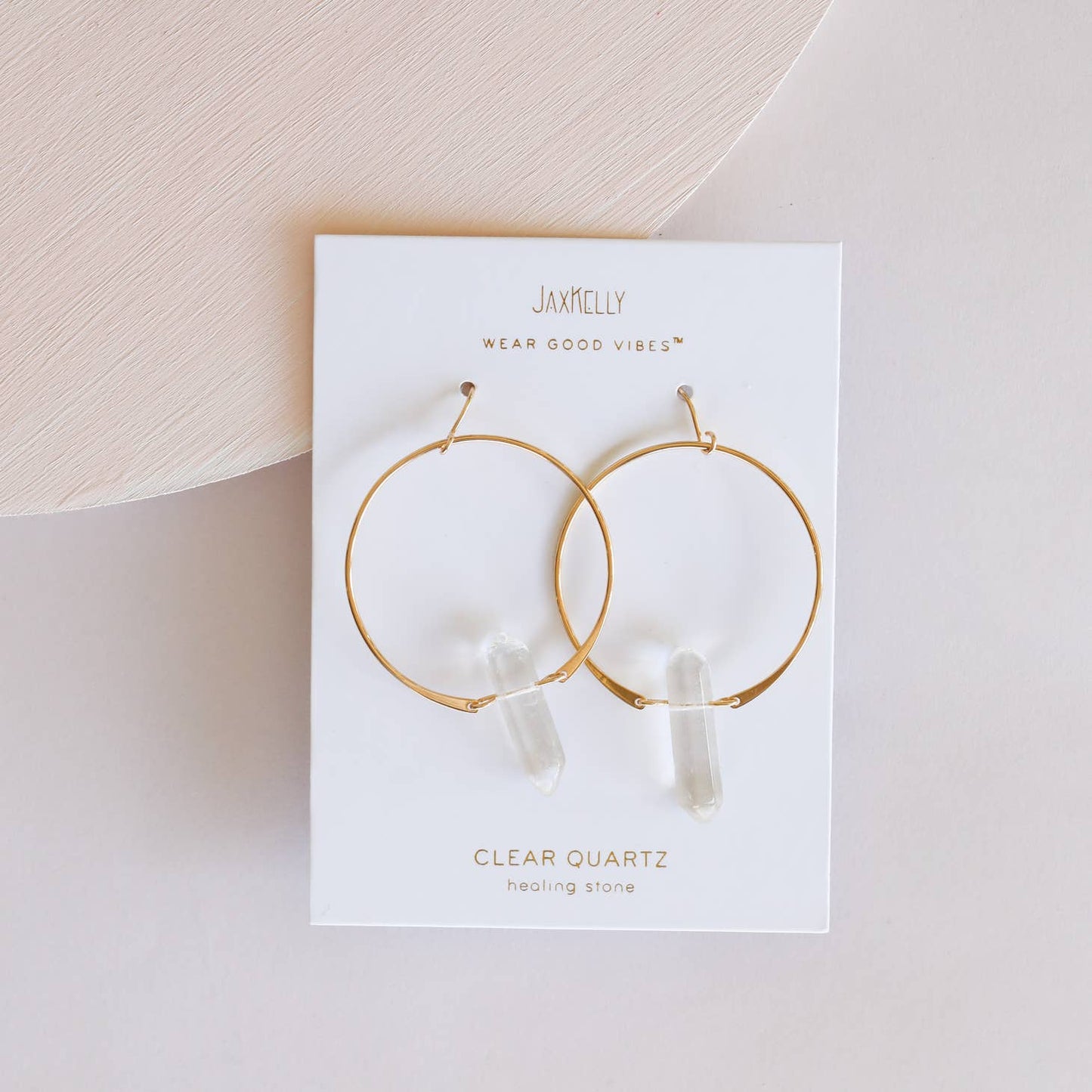 JAXKELLY CLEAR QUARTZ HOOPS