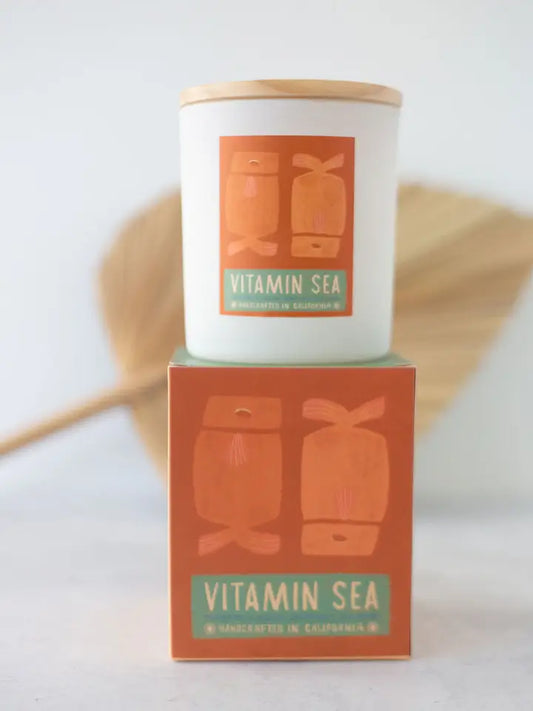 FEATHER AND COCO VITAMIN C CANDLE 7 OUNCE