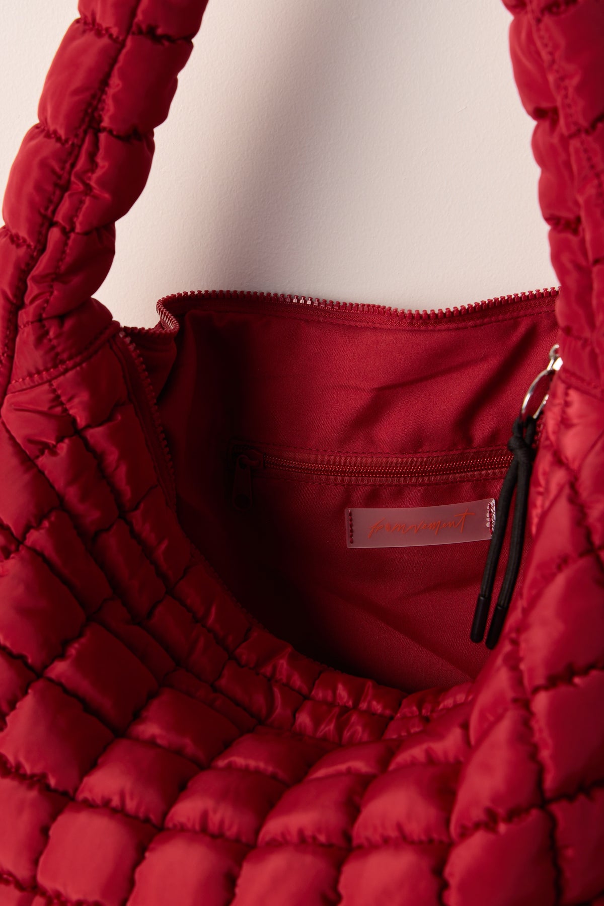 FREE PEOPLE MOVEMENT QUILTED CARRY ALL BRICK 1