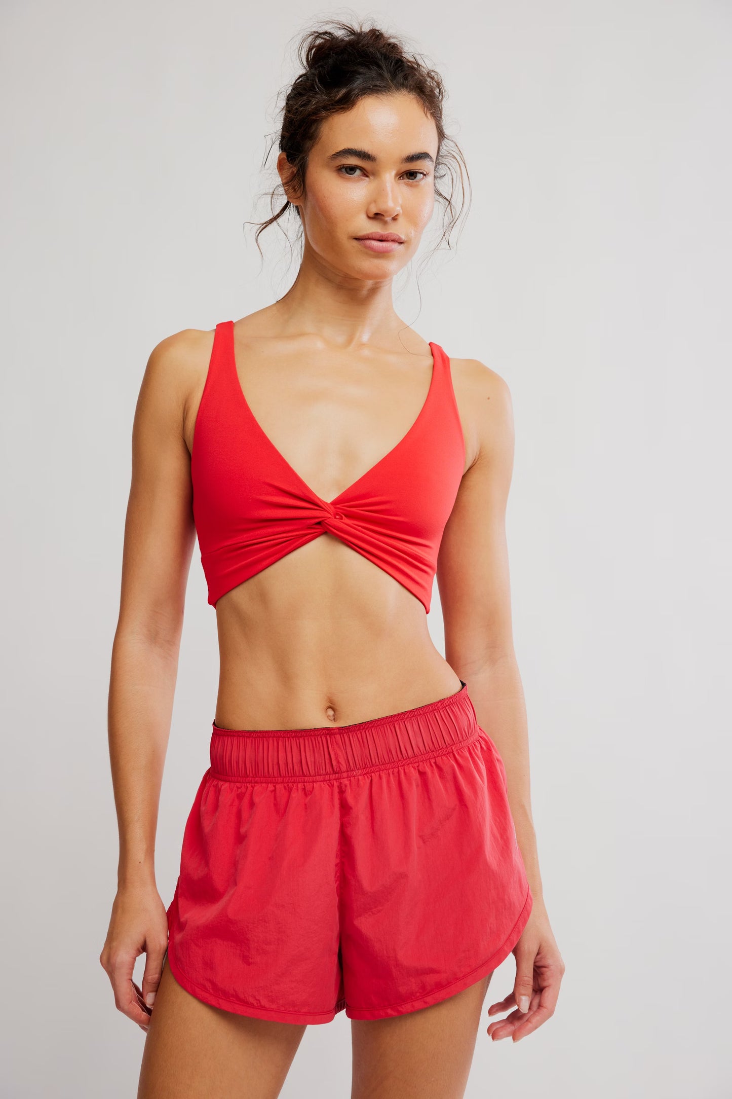 FREE PEOPLE NEVER BETTER REVERSIBLE TWIST CROP GRAPEFRUIT