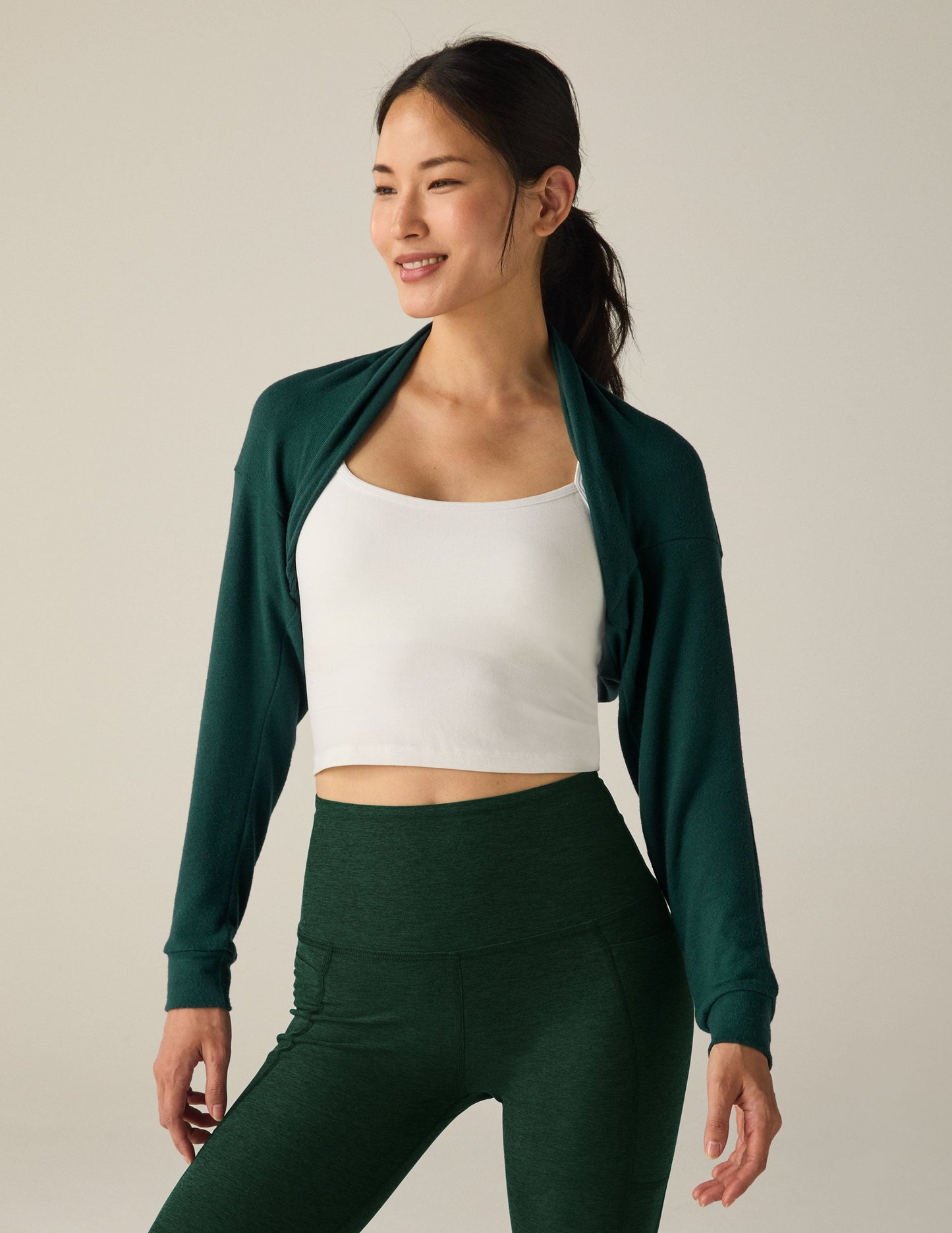 BEYOND YOGA DUET 2-WAY CONVERTIBLE SHRUG DARK SPRUCE GREEN