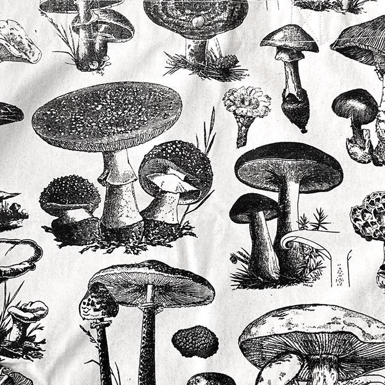 Pattern of black and white mushroom illustrations on a light background